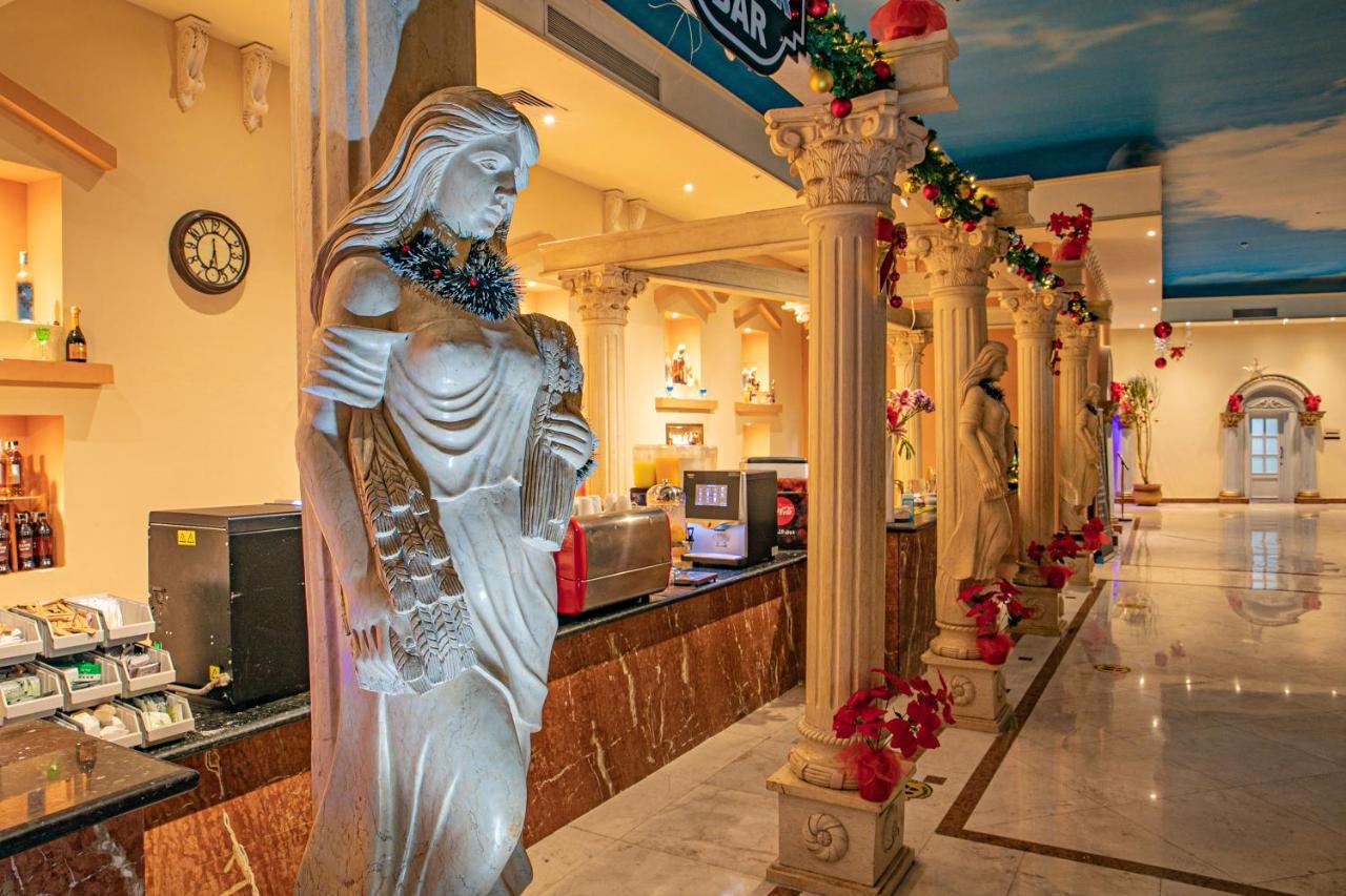 Titanic Palace Families And Couples Only Hurghada Exterior foto Statue of the Virgin Mary at the airport